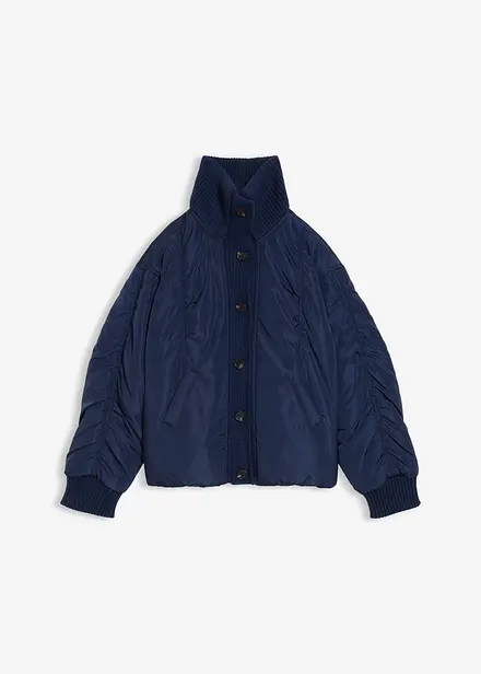 Vadderad jacka med stickade muddar