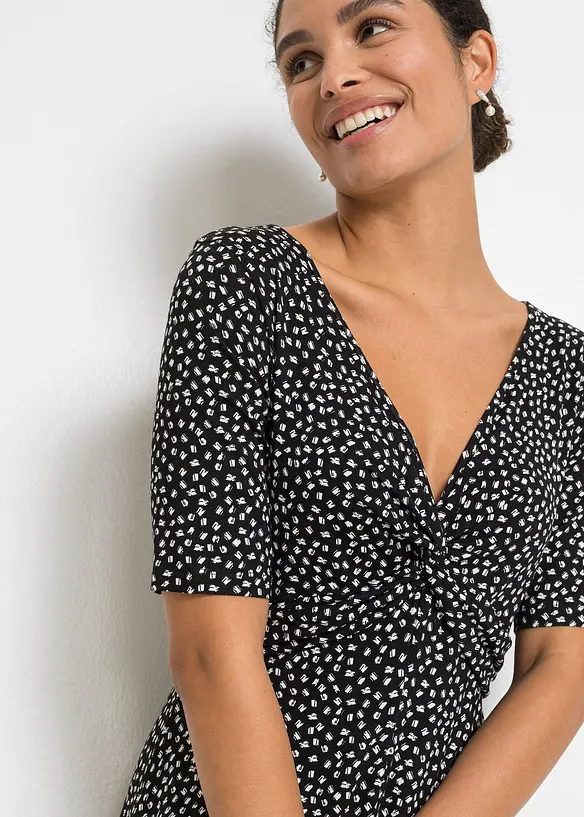 Mönstrad jerseyklänning med drapering, bonprix