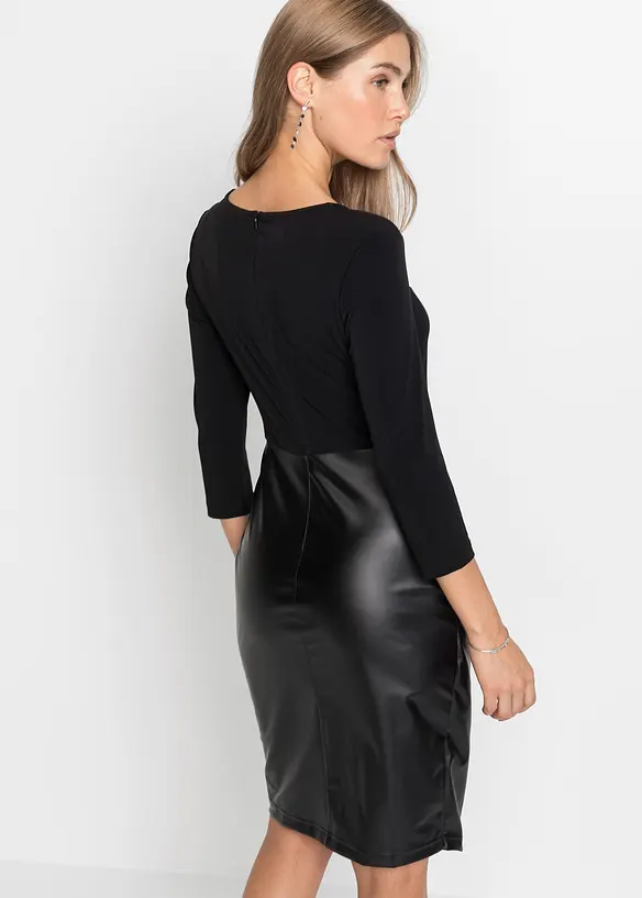 Klänning av skinnimitation med jerseyöverdel, bonprix