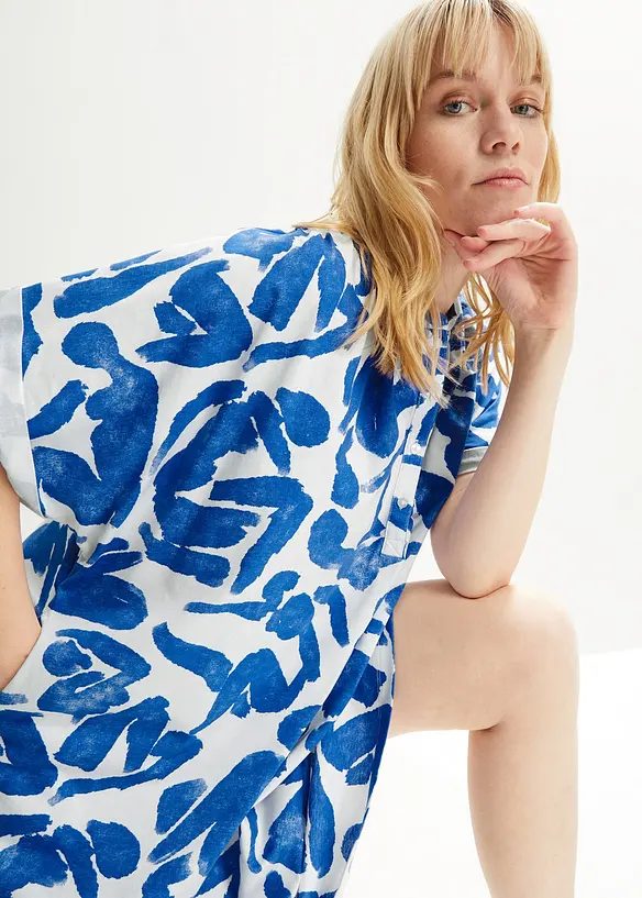 Knälång jerseyklänning med fickor, A-linjemodell med oversize-fit, bonprix