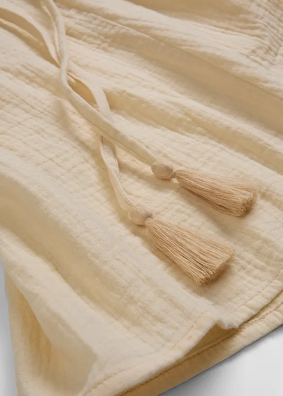 Kort klänning i skaterstil med knytskärp och puffiga 3/4-ärmar, bonprix