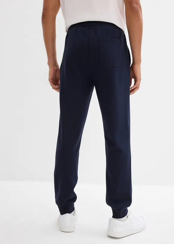 Joggingbyxa med ribbad mudd i bensluten, bonprix
