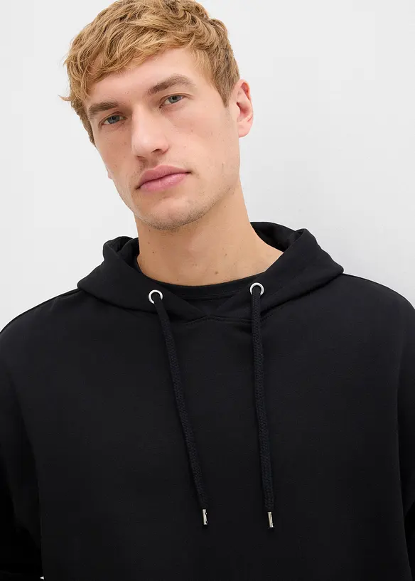 Sweatshirt med huva i ekologisk bomull, avslappnad passform, bonprix