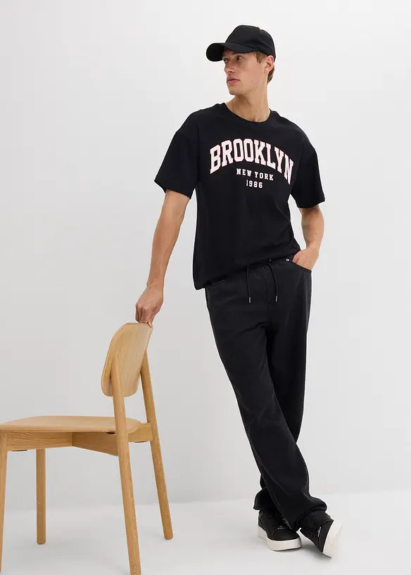 Dra-på byxa av bomull i Relaxed Fit med Tapered ben, bonprix