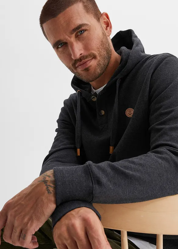 Sweatshirt med huva och mjukt ruggad insida samt detaljer i skinnimitation, bonprix