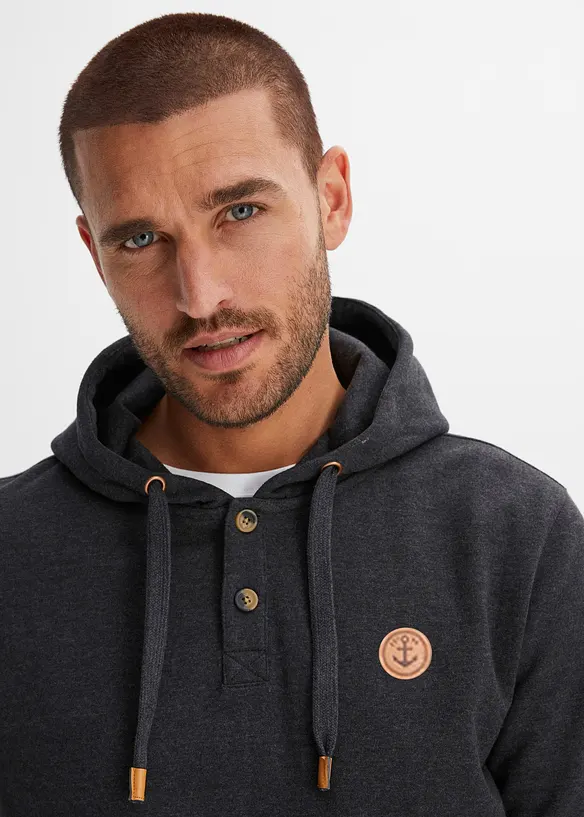 Sweatshirt med huva och mjukt ruggad insida samt detaljer i skinnimitation, bonprix