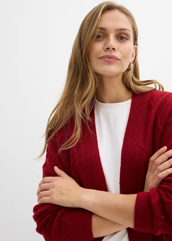 Stickad kofta med flätmönster, bonprix