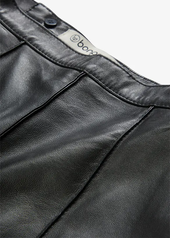 Skinnkjol i utställd modell, av lammnappa, bonprix