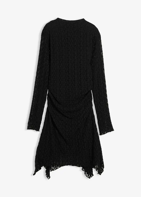 Spetsklänning med flikig nederkant, bonprix