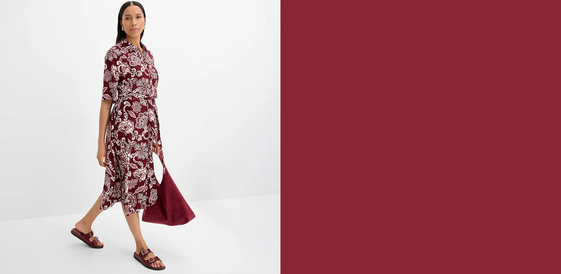 Eleganta skjortkl&auml;nning med r&ouml;tt-rosa blommigt m&ouml;nster och midjesk&auml;rp.

