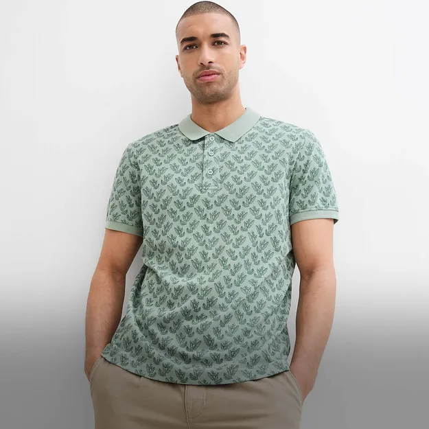 Randig pik&eacute;tr&ouml;ja i bl&aring;tt, gult och vitt.