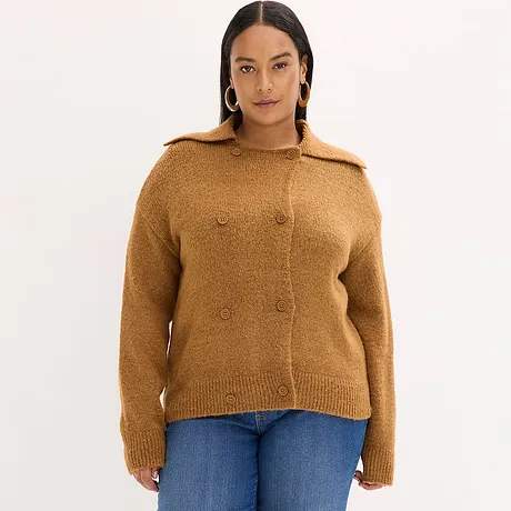 Brun cardigan med knappar och krage kombinerad med blå jeans.