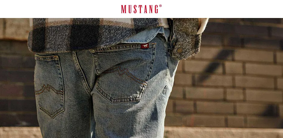 Tvättade jeans med fickor från Mustang.