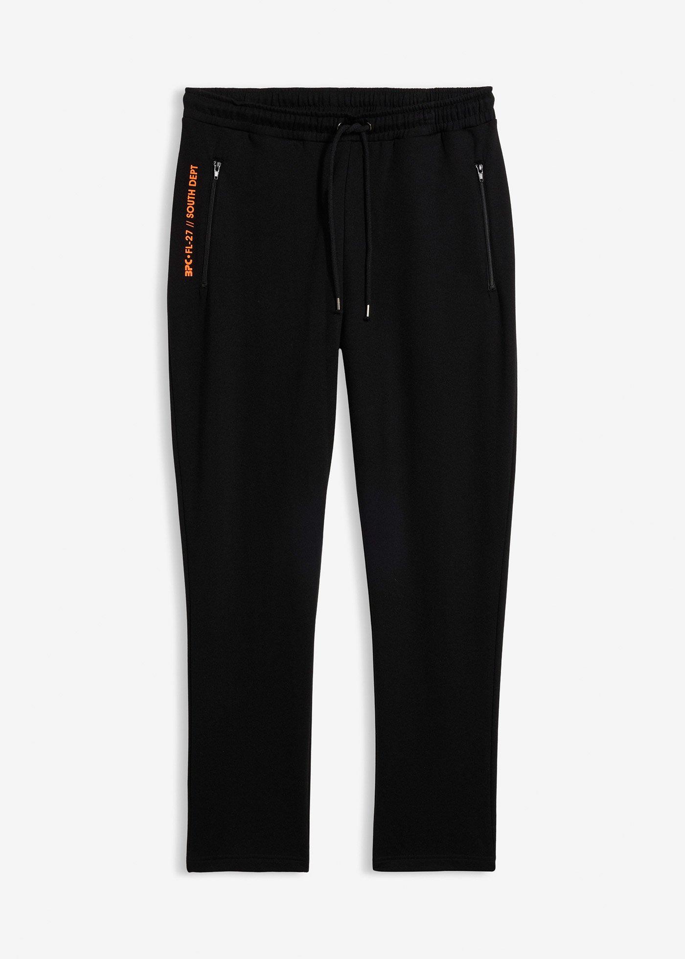 bonprix – Joggingbyxa med fickor med dragkedja