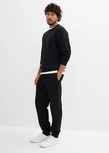 Värmande joggingbyxa med fickor med dragkedja, bonprix