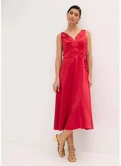 Mellanlång klänning i glansig satin med blomapplikation, bonprix