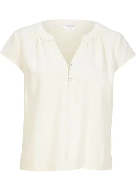 Kort linneblus med slits i sidan