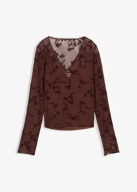 Långärmad topp med sirligt mönster