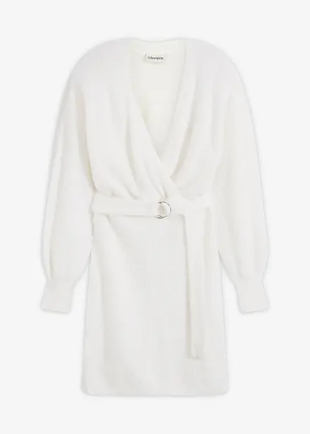 Stickad klänning med spänne i figurnära modell