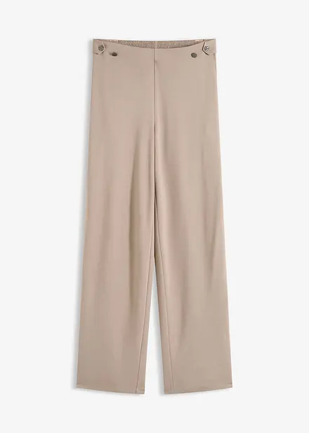 Jerseybyxa med dekorativa slejfar