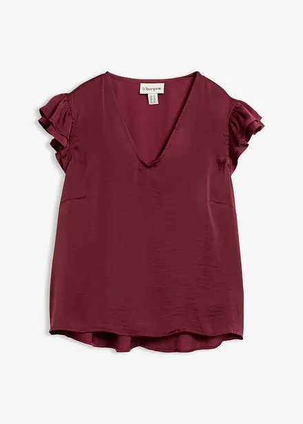 Blus med volanger