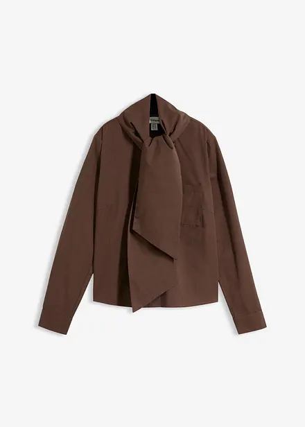 Blus med sjaldetalj