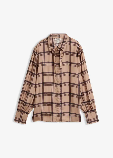 Blus i glansigt material av kupro och siden