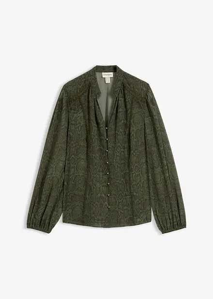 Blus med spetsdekoration