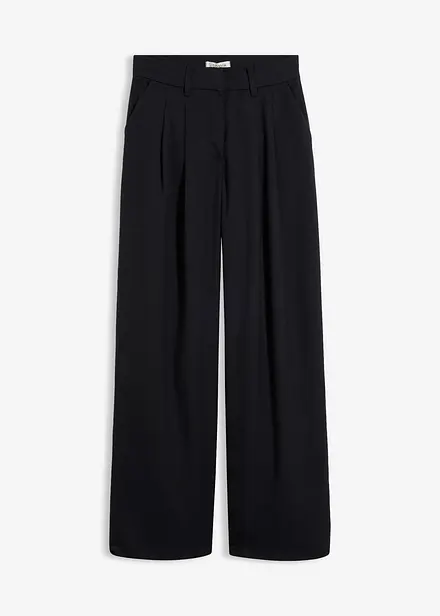 Byxa i materialmix med yllelook