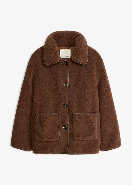 Jacka i teddymaterial med p&aring;sydda fickor