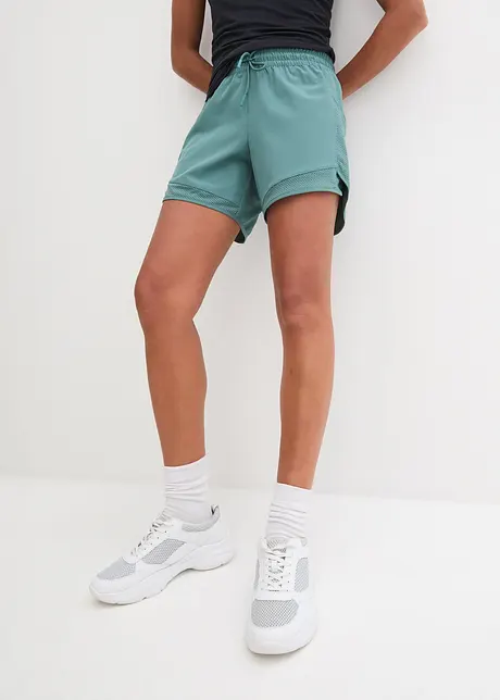 Funktionsshorts med mobilficka, bonprix