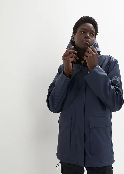 Regnjacka med teddyfoder gjord av ett vattentätt material, bonprix