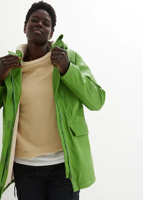 Regnjacka med teddyfoder gjord av ett vattent&auml;tt material, bonprix