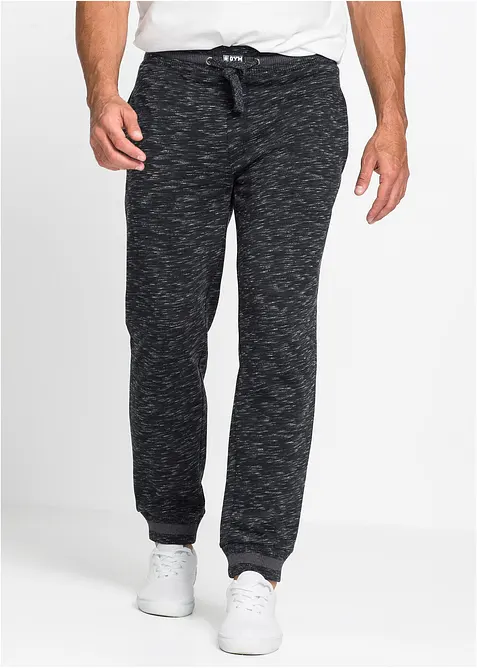 Melerad joggingbyxa med ribbstickade muddar, bonprix