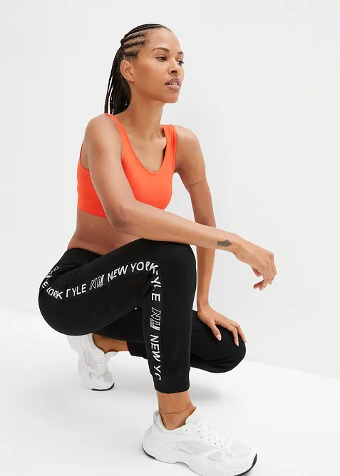 Trikåbyxa med muddar och texttryck, bonprix