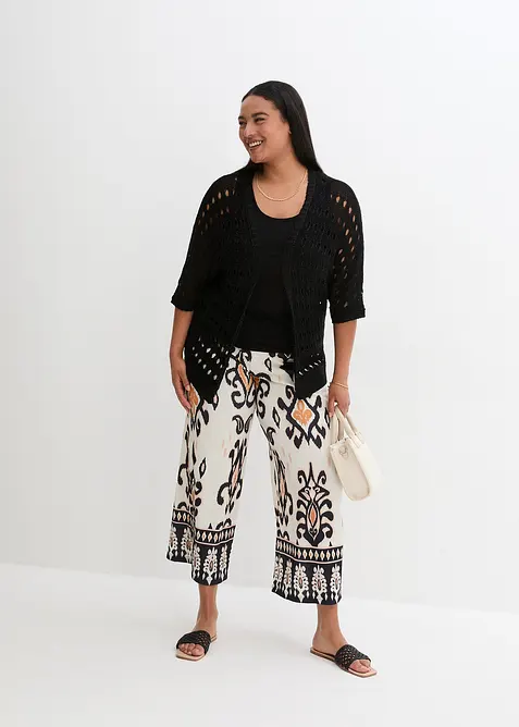 Hålmönstrad cardigan med glittrande tråd, bonprix