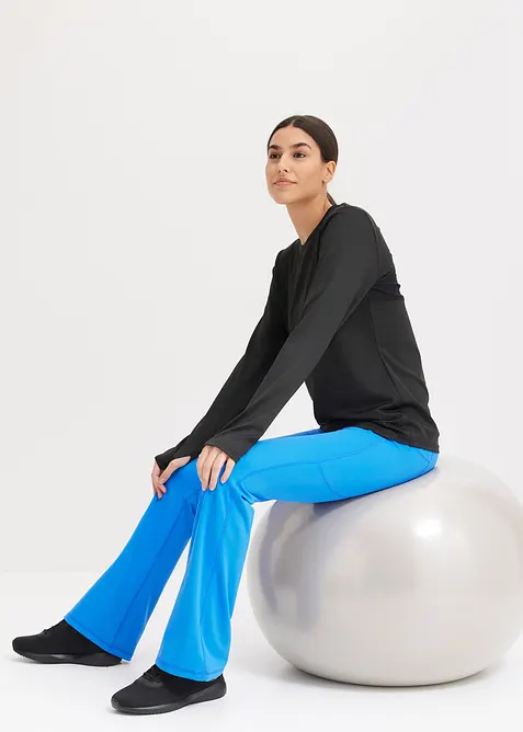 Snabbtorkande sportleggings med mobilficka, utst&auml;llda ben, bonprix
