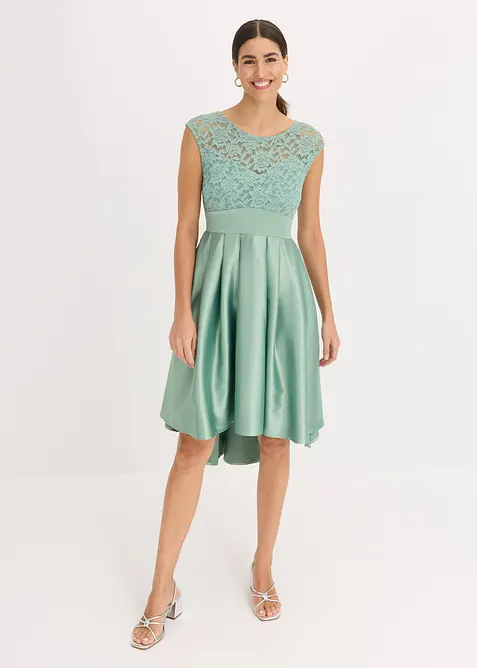 Klänning som är längre bak än fram i glänsande satin, bonprix