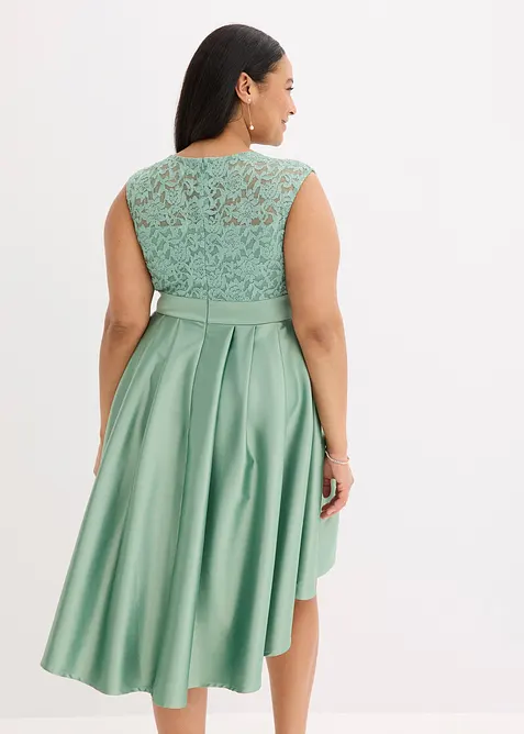 Klänning som är längre bak än fram i glänsande satin, bonprix