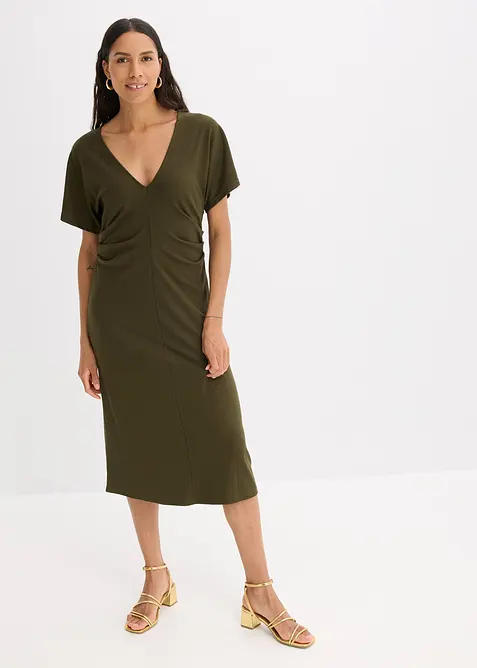 Ribbstickad jerseyklänning med rynk i sidan, bonprix