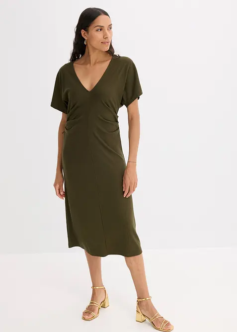 Ribbstickad jerseyklänning med rynk i sidan, bonprix