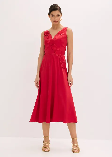 Mellanl&aring;ng kl&auml;nning i glansig satin med blomapplikation, bonprix