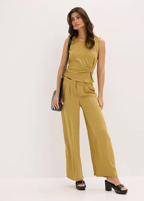 Byxa i material med struktur, bonprix