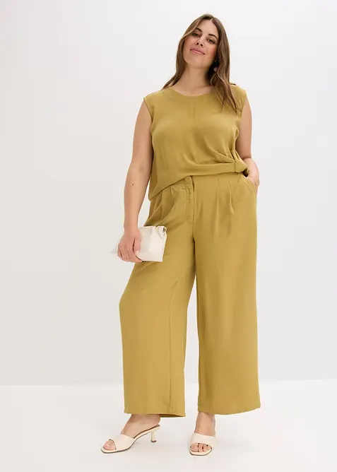 Byxa i material med struktur, bonprix