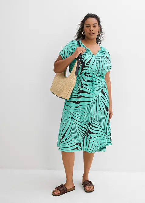 Jerseyklänning i böljande materialmix, bonprix