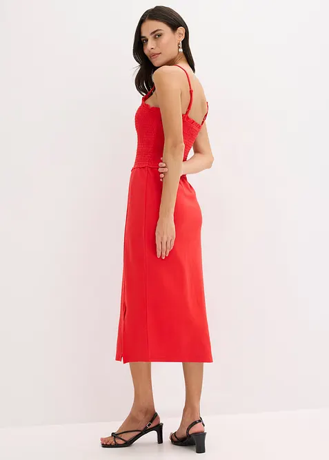 Smockad, mellanlång klänning i stabil jersey med slits, bonprix