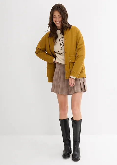 Kort byxkjol med motveck, bonprix