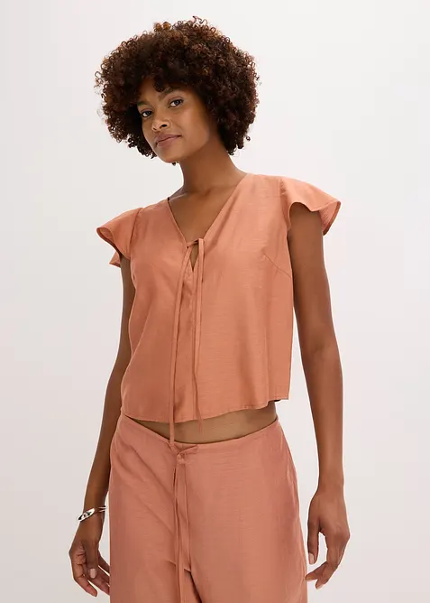 Blus med volangärmar i  glansigt material, bonprix