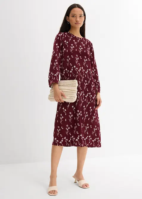 Blommig midiklänning av ren viskos, bonprix