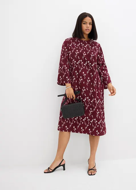 Blommig midiklänning av ren viskos, bonprix